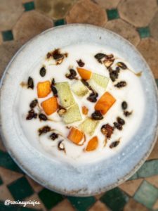 Coconut yogurt with caramelized fruits and seeds